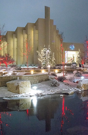 Christmas lights aglow with new snow shine bright around the BYU-Idaho Taylor Building