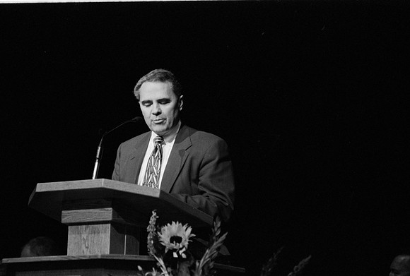 President Stephen D. Bennion conducting the devotional at Ricks College