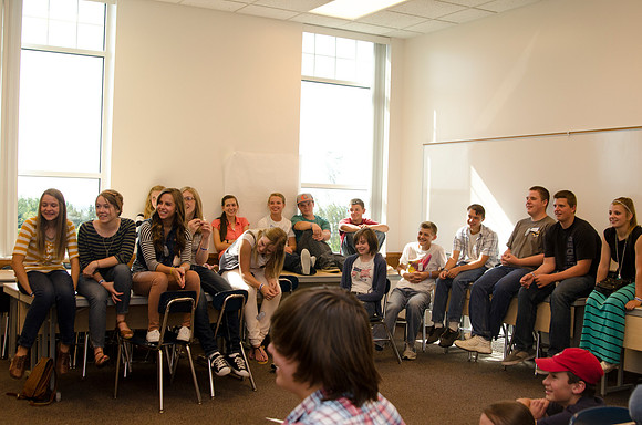 Participants in the Education Week 2013 Youth Program meet together in the Gordon B. Hinckley Building. Photo by Taylor Davenport