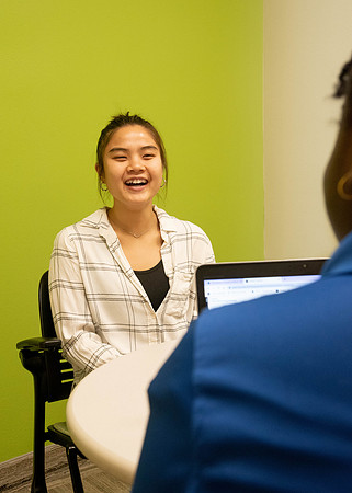Students mentoring other students at the Mentor Hub at the Manwaring Center.