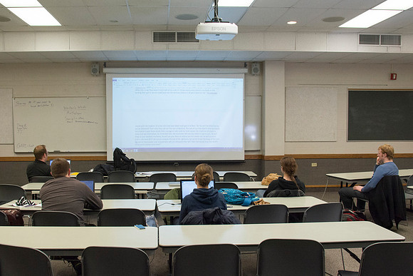 Students participate in the Writing Workshop to receive critiques on their work.