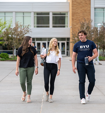 Student models for Admissions Viewbook cover options. May 2023