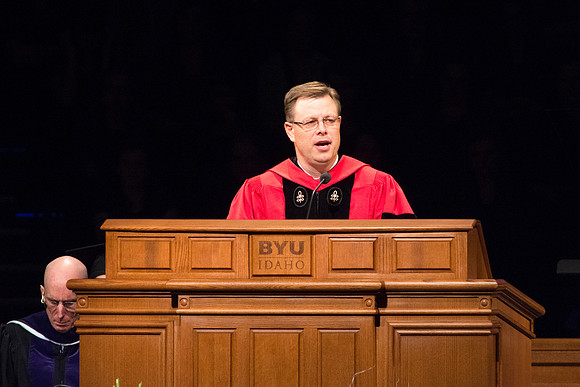 President Clark G. Gilbert conducting during Commencement