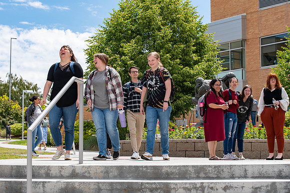 Students get free hot dogs, and enjoy activities at the Amphitheatre. IBC Business sell their products.