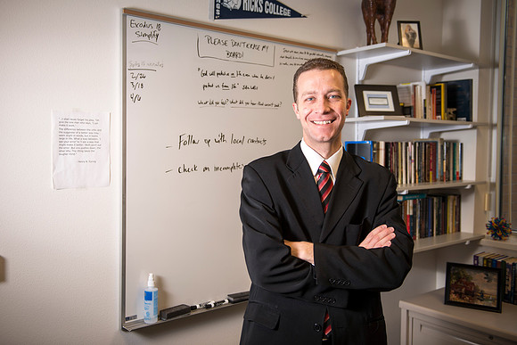 Riley Hall, from Admissions in the Kimball, works in his office.