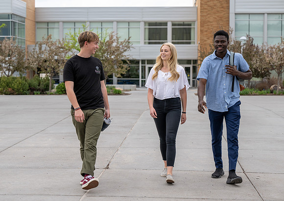 Student models for Admissions Viewbook cover options. May 2023