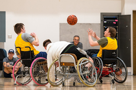 Students participate of Wheelchair Basketball in the Hart Gym.