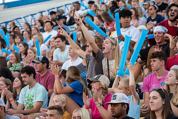 BYU-Idaho Football Teams compete in the Final Game of the Season. Students cheer them on from the stands, as the spirit team and Rix Stix Rally them up.