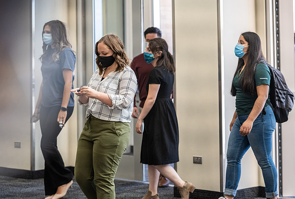 Students use hand sanitizer on campus to stay safe and healthy.