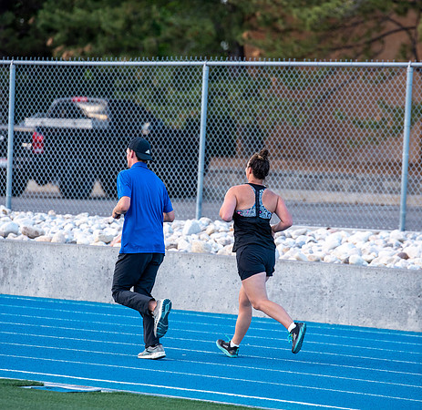 Faculty and community members of BYUI at Speed and Agility triathlete trannings at the stadium.