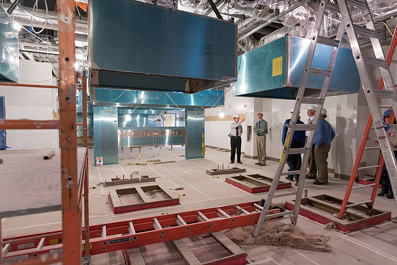 Faculty Members tour some of the kitchens located in the new science building while it is still under construction.
