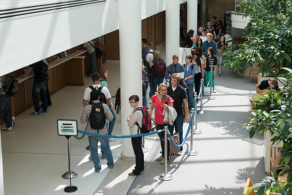 Students waiting in line for a Cashier in the Kimball Building on the First Day of School.