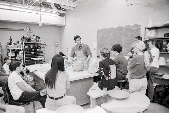 Rich Briggs demonstrates to the students in class.