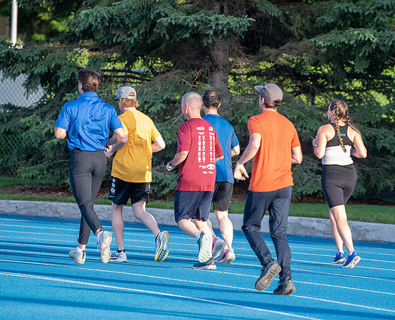 Faculty and community members of BYUI at Speed and Agility triathlete trannings at the stadium.