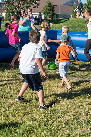 Faculty and their families, as part of the Online Learning & Teaching Conference, join together for dinner and games.