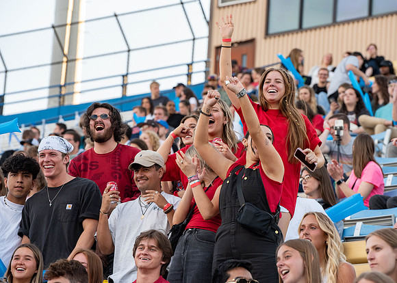 BYU-Idaho Football Teams compete in the Final Game of the Season. Students cheer them on from the stands, as the spirit team and Rix Stix Rally them up.