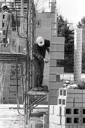 Construction takes place on the Religion Building site.