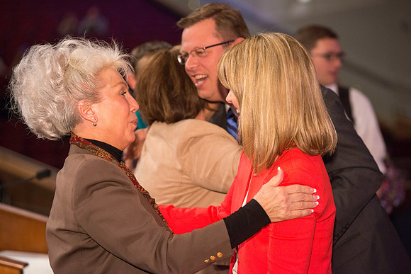 President and Sister Gilbert greet students after the first devotional of the semester.