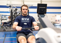 A student using the rowing machine at the Hart Fitness Center.