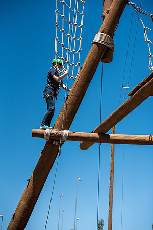 Online Instructors come to BYU-Idaho campus for further learning to enhance teaching skills. Instructors take their turn at the Ropes Course.
