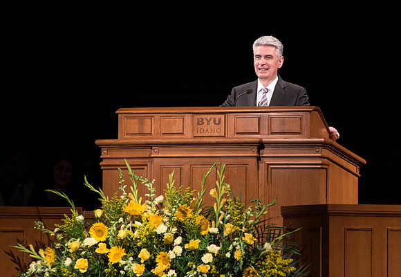 Presiding Bishop, Gérald Caussé, speaks to BYU-Idaho students at devotional. Photo by Ryan Chase