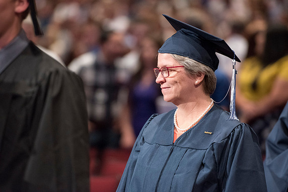 Graduate and Pathway missionary, Sister Brett, of Brigham Young University-Idaho entering Convocation ceremony of the Spring 2016 semester. Photo by Ryan Chase.