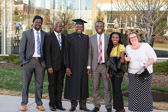 Students gather in their cap and gowns for graduation from BYU-Idaho April 6, 2016.
