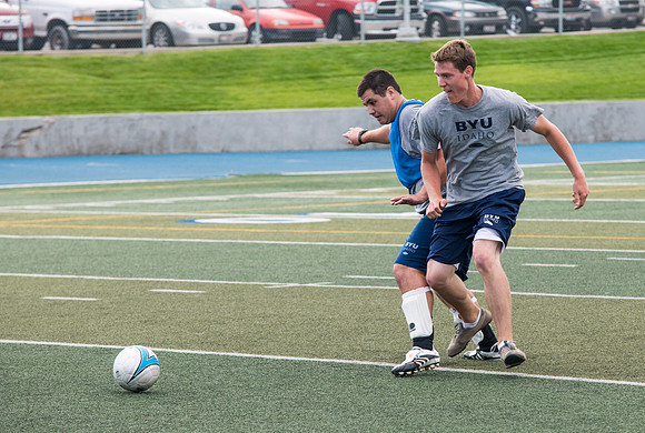 Students show off thier skills in a soccer class the first day of school.