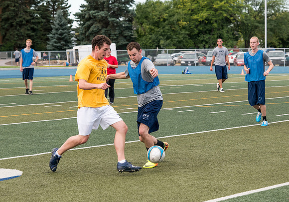 Students show off thier skills in a soccer class the first day of school.