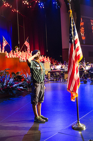 Members of the Collegiate Singers, Men's Choir, Women's Choir, and Symphony Band all perform together at the Patriots and Pioneers Concert.