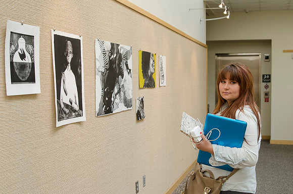 Sophia looking at the art work on the top floor of the Spori Building