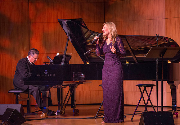 Marvin Goldstein and Vanessa Joy perform in the Barrus Concert Hall during education week at BYU-Idaho.