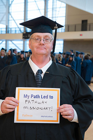 Pathway graduates gather before commencement.