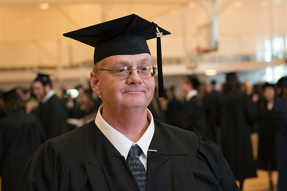 Pathway graduates gather before commencement.