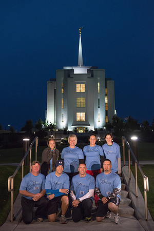 Team members pose by the Rexburg temple before they begin the temple to temple run
