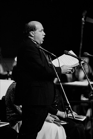 Sacred Music Series: Visions of Eternity. Soloist sings a piece for the performance. Performance held in the Hart Auditorium of Ricks College.