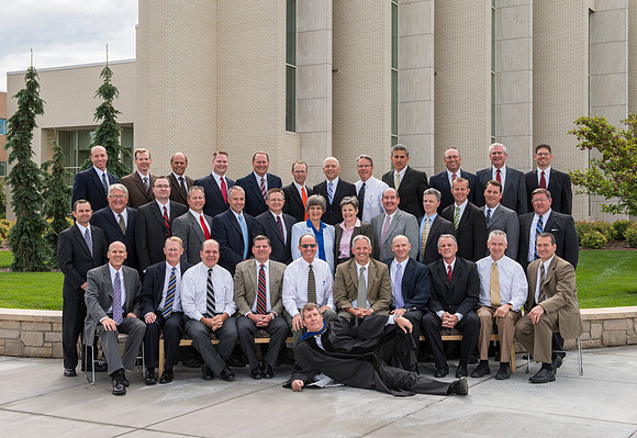 Group photo of the Religion Department in front of the Taylor Building.