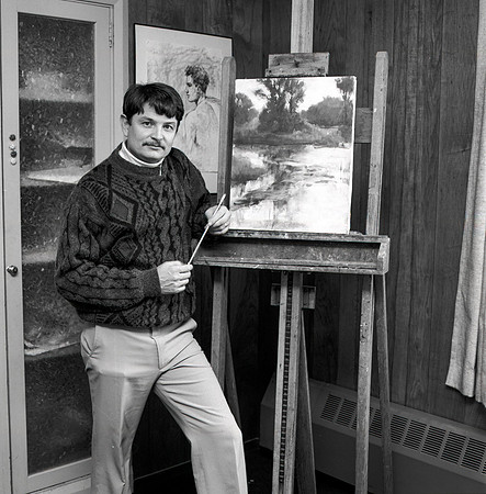 Nolan Pearson stands next to his work.