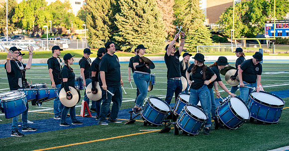 BYU-Idaho Football Teams compete in the Final Game of the Season. Students cheer them on from the stands, as the spirit team and Rix Stix Rally them up.
