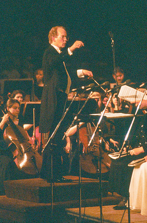 Conductor, Kevin Call, leads the Orchestra and Choir during the performance. Performance located in the Salt Lake Tabernacle.