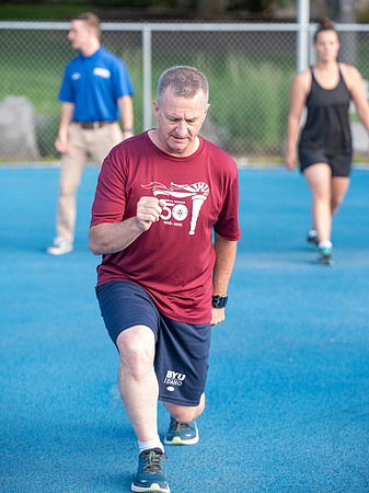 Faculty and community members of BYUI at Speed and Agility triathlete trannings at the stadium.