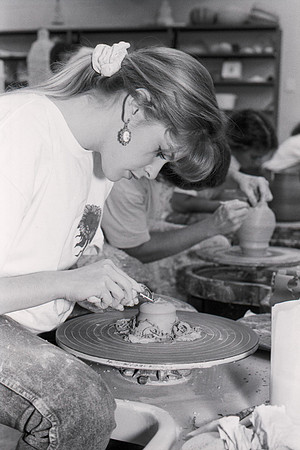 Jessica Larra, from Cleveland, Ohio, works diligently on a piece of clay.