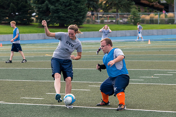 Students show off thier skills in a soccer class the first day of school.