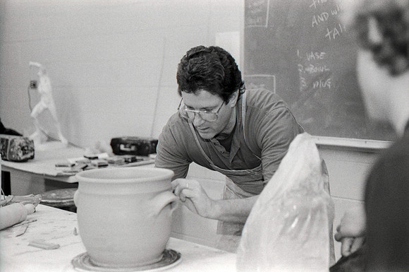 Rich Briggs demonstrates to the students in class.