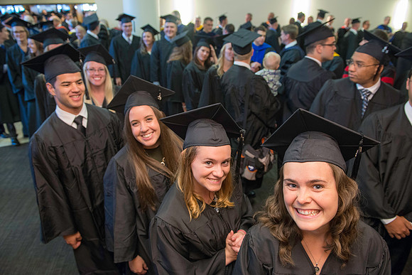 Graduates gather for the processional before BYU-Idaho commencement.
