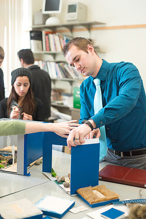 Graphic Design Class taught by Shawn Randall. Students work in teams designing museum space for the Geotourism Museum in Driggs, Idaho. The winning group will help implement their design.