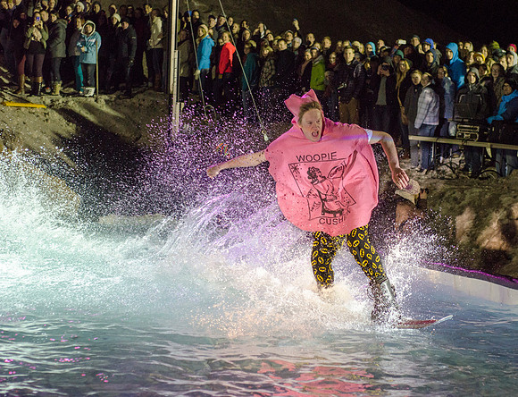 Students at Brigham Young University-Idaho take part in the annual Pond Skimming event held on campus at BYU-Idaho. Students wait in the cold or take the daring attempt to skim a pool of water using a