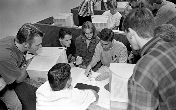 Students participating in an interactive class with BYU.