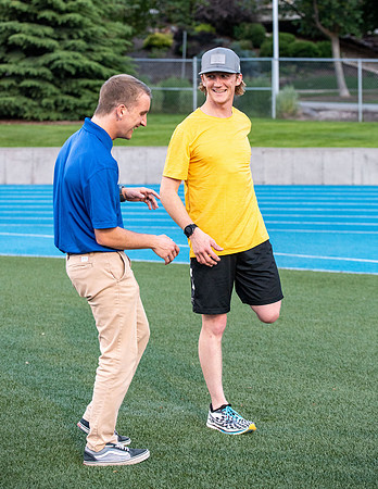 Faculty and community members of BYUI at Speed and Agility triathlete trannings at the stadium.
