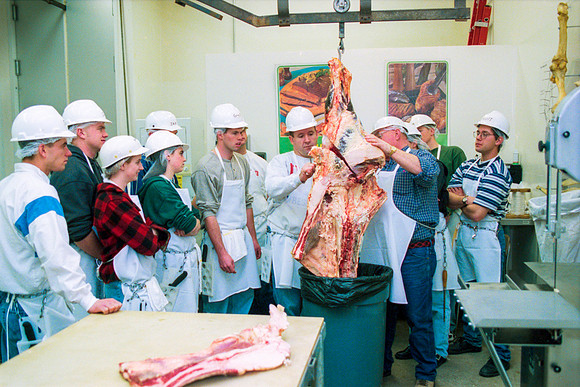 Students participate in a Meat Cutting Lab. February 2000.